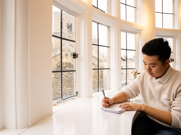 student working by window